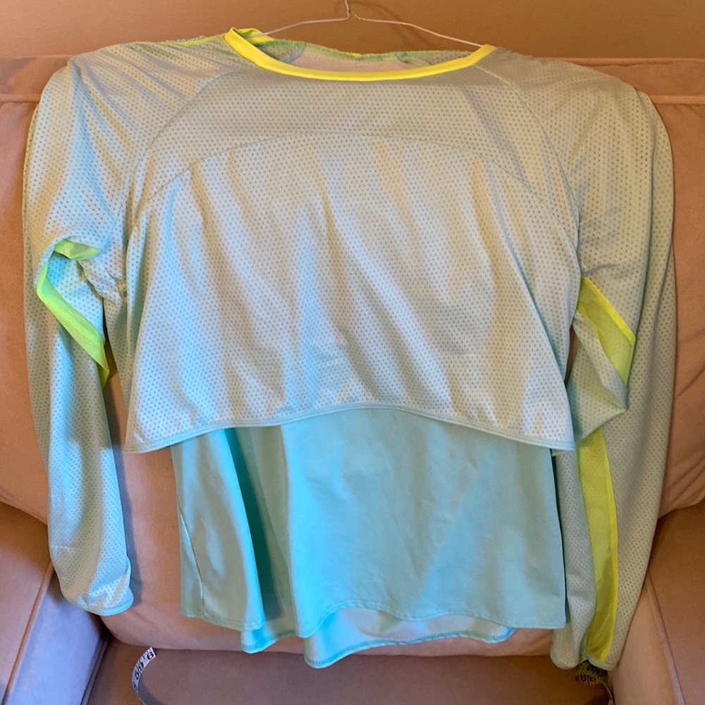 Lucky in love tennis top. Full coverage from sun exposure. Size large.